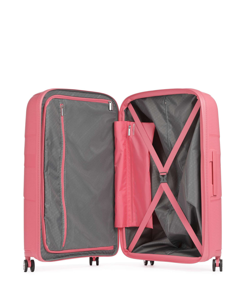 American Tourister Starvibe Spinner (4 wheels) sun kissed coral
